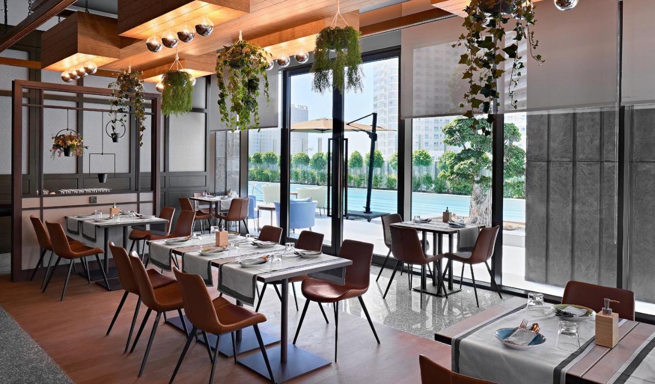 Revier Hotel Дубай Екстериор снимка